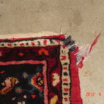 torn fringe on oriental rug