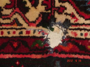 Before photo of Oriental Rug Damage