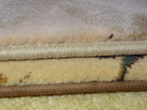 Rug Binding in Raleigh - Poly (brown) & Serge Tape (white)