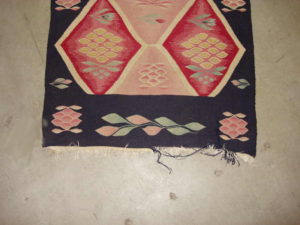 area rug with frayed fringe